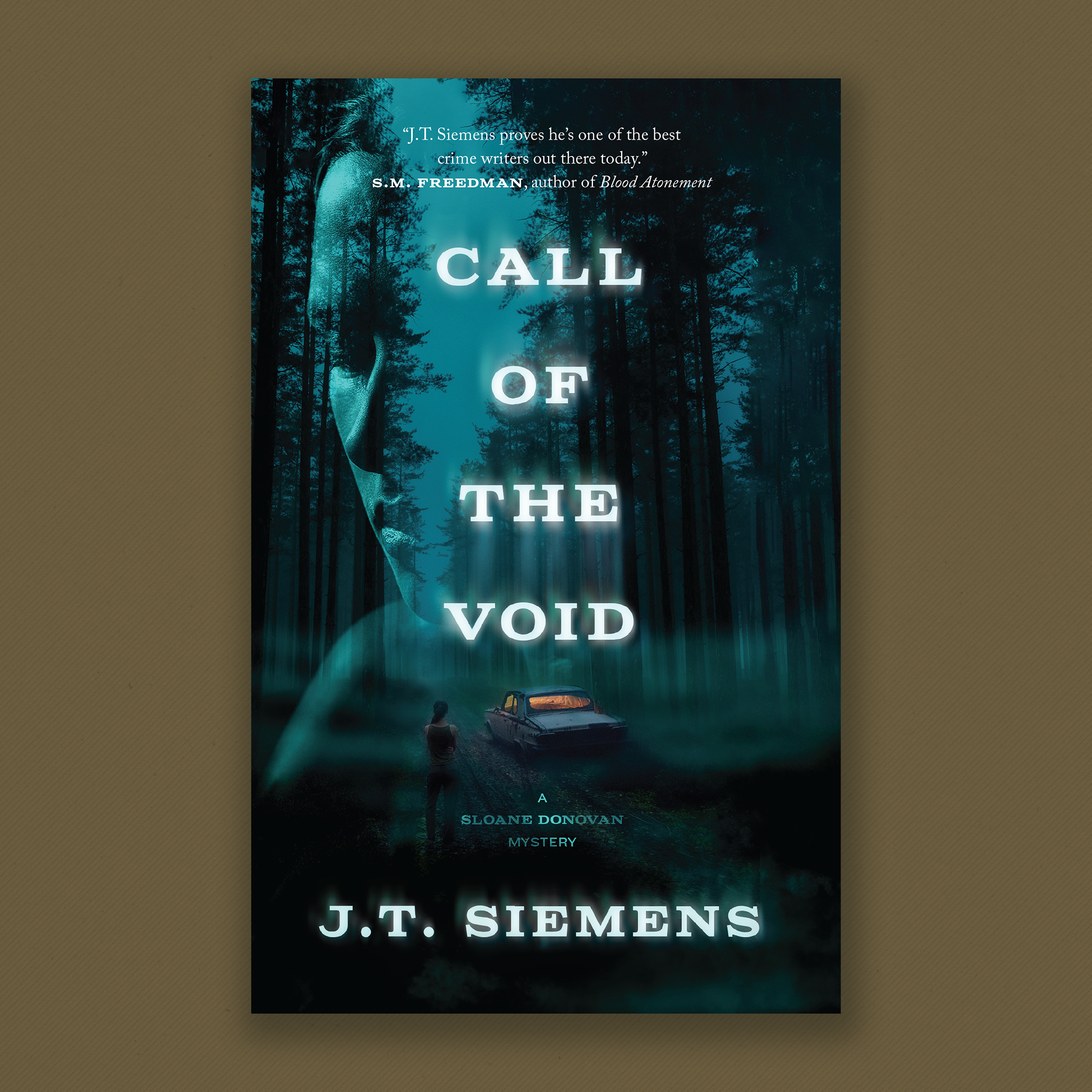 Book Cover: Call of the Void by J.T. Siemens. A Sloane Donovan Mystery. A dirt road runs through a forest of tall, thin trees in bluish light. A woman stands with her back to the viewer, staring at a delipidated car with an illuminated interior. Cover blurb: J.T. Siemens proves he’s one of the best crime writers out there today. S.M. Freedman, author of Blood Atonement.